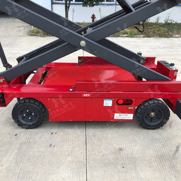 OXLIFT QZ-050-090 самоходный (поводковый) подъемник ножничного типа с питанием от акб 9000 мм 500 кг HV Market